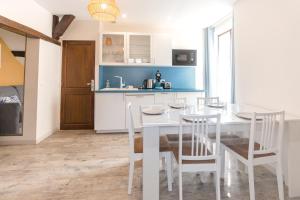 Appartements Au Bourg Neuf : photos des chambres