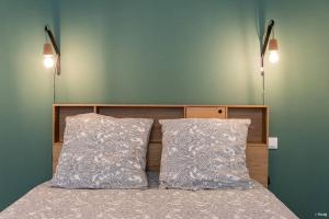 Appartements LE DANDY - T2 CENTRE HISTORIQUE : photos des chambres