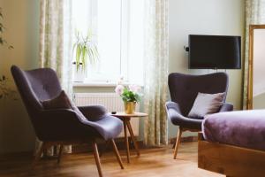 Triple Room with Sofa Bed room in Hotel Benevilla