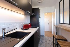 Appartements Le petit Manhattan - Appartement prive de 45 m2 - 2 a 4 personnes - Parking prive : photos des chambres