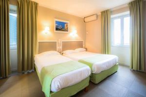 Hotels Sud Hotel Restaurant : photos des chambres