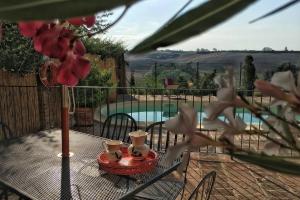 Pasqui Villas La Capanna accogliente casa in paese con vista piscina WiFi