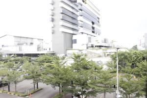 Pleasant Studio Semi Apartment at The Lodge Paskal near BINUS University By Travelio