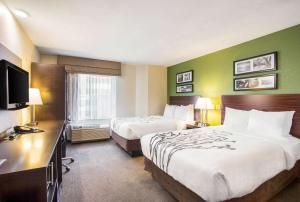 Double Room with Two Double Beds - Non-Smoking room in Sleep Inn Kansas City International Airport