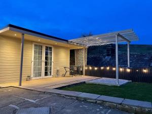 Apple tree hut, in a private garden