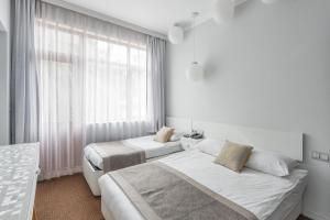 Budget Triple Room with External Bathroom room in Delight Deluxe Hotel & Spa
