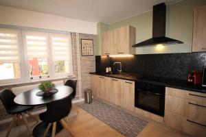 Appartements Appartement tout confort, meuble et equipe. : photos des chambres