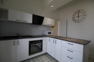 Appartements Le Cru Colbert : photos des chambres