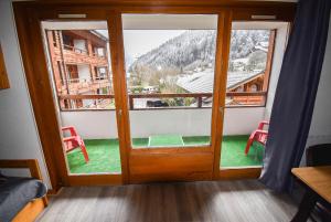 Appartements L'Enchalpe, Grand et lumineux studio avec coin montagne 5 personnes, 60m des pistes, PISCINE COUVERTE, grand balcon expo EST, DRAPS NON COMPRIS : photos des chambres