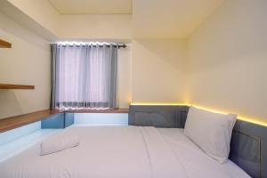 Comfort and Strategic 3BR Meikarta Apartment By Travelio