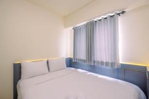 Comfort and Strategic 3BR Meikarta Apartment By Travelio