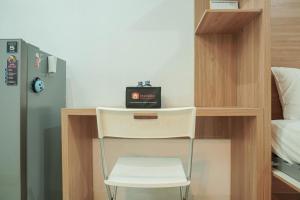 Lovely and Strategic Studio at Green Pramuka Apartment By Travelio