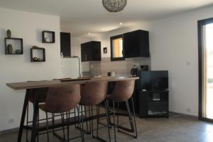 Appartements Rez-de-jardin avec vue sur la Sainte Victoire : photos des chambres