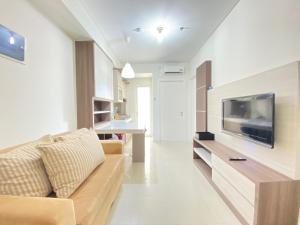 Private & Bright 2BR Apartment at Parahyangan Residence near Nara Park By Travelio