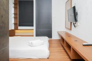 Studio Modern Japanese Style near Aeon BSD at B Residence Apartment By Travelio