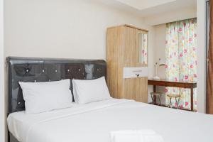 Lovely Studio Apartment M-Town Residence near Summarecon Mall By Travelio