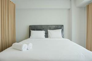 Gorgeous 2BR Apartment Maqna Residence By Travelio