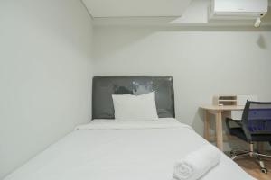 Gorgeous 2BR Apartment Maqna Residence By Travelio