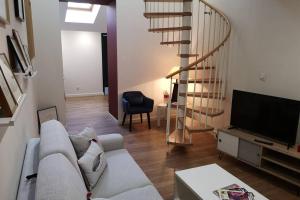 Appartements Le Duplex des QUAIS : photos des chambres