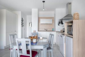 Appartements Esprit villa balneaire sur la cote bretonne pour trois personnes : photos des chambres