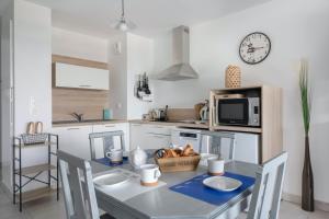 Appartements Esprit villa balneaire sur la cote bretonne pour trois personnes : photos des chambres