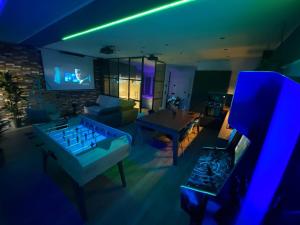 Appartements Capsule Gaming balneo & billard & babyfoot & sauna 2 chambres : photos des chambres