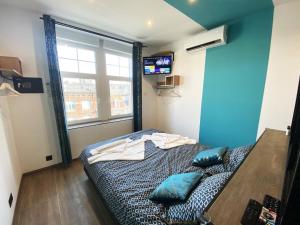 Appartements Capsule Gaming balneo & billard & babyfoot & sauna 2 chambres : photos des chambres