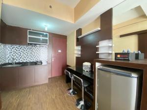 Spacious 1BR at Tamansari Panoramic Apartment near Metro Indah Mall By Travelio