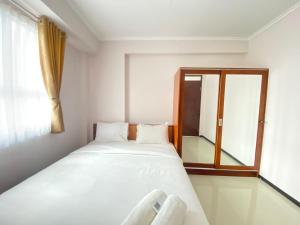 Simply Homey 2BR Apartment at Gateway Pasteur By Travelio