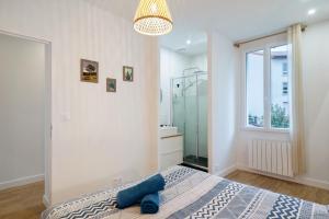 Appartements Hapetenia - Appartement Exotique et Familial - Parking, Wifi & Netflix : photos des chambres