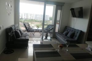 Hermoso apt con BBQ en balcon y Vista a la piscina