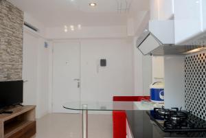 2BR Comfy Bassura City Apartment By Travelio