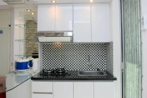 2BR Comfy Bassura City Apartment By Travelio