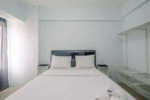 Cozy Stay 2BR Tamansari Mahogany Apartment By Travelio - Badami