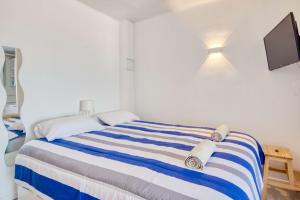 Appartements Appartement - Les Pieds Dans L'Eau : photos des chambres
