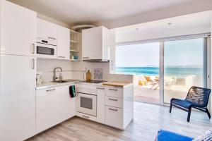 Appartements Appartement - Les Pieds Dans L'Eau : photos des chambres