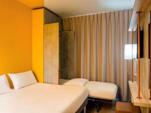 Hotels ibis budget Reims Parc Des Expositions : photos des chambres