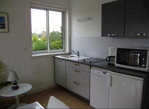 Appartements STUDIO + La Baule 20m de la mer : photos des chambres