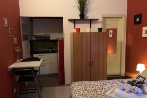 "Little Sicilian Home"-room with a private bathroom & kitchen -fridge - and shared a beautiful terrace on Hostel Taormina Center