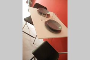 "Little Sicilian Home"-room with a private bathroom & kitchen -fridge - and shared a beautiful terrace on Hostel Taormina Center