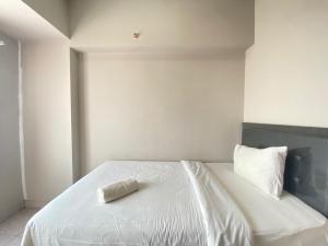 Comfy 2BR Apartment at Newton Residence near Tol Buah Batu By Travelio