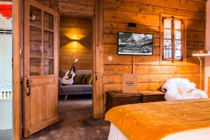 Hotels Hotel Les Roches Fleuries : photos des chambres
