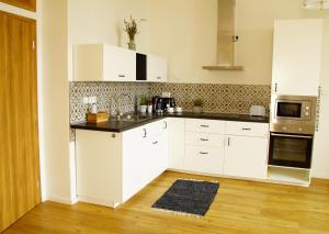 Apartmány u komína