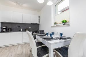 Apartamenty Osiedle Bursztynowe II by Renters