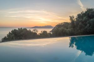 Tsamadou Beach, Kokkari, 83100, Greece.