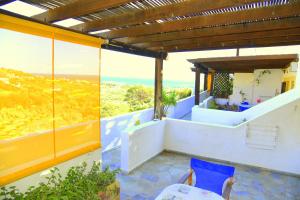 Two-Bedroom Apartment (4 Adults) room in Filoxenia Villa