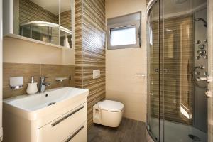 Two-Bedroom Apartment room in AZZURO Delux with Pool near the Beach
