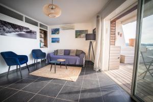 Appartements Les pieds dans l'eau Plage Saint-Jean : photos des chambres