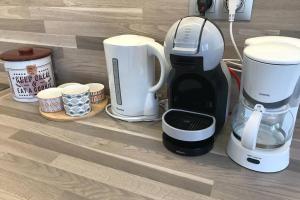 Appartements LES JARDINS - terrasse & jardin au calme : photos des chambres