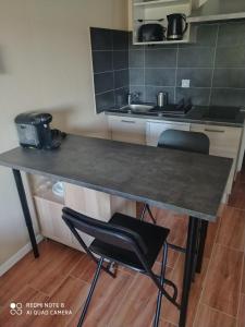 Appartements Charmant studio avec piscine et clim (en ete) : photos des chambres